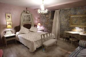 Postel nebo postele na pokoji v ubytování Castillo de Piedrasecha