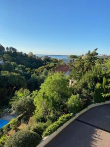 an aerial view of a road with trees and bushes at Appartement Luxueux 150m2 - Cannes in Cannes