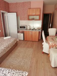 Kuchyň nebo kuchyňský kout v ubytování Art Guest House Orchidea