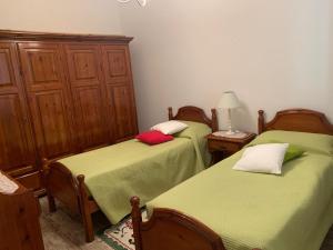 Posteľ alebo postele v izbe v ubytovaní Casa Caterina in centro