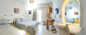 Letto o letti in una camera di Avraki