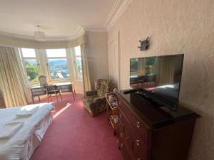 TV a/nebo společenská místnost v ubytování Dunrigh Guest House