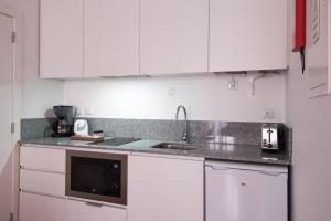 Lisbon Serviced Apartments - Campos的厨房或小厨房