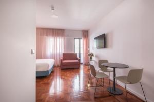Lisbon Serviced Apartments - Campos客房内的一张或多张床位