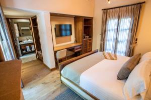Vuode tai vuoteita majoituspaikassa Hotel Apapacho Boutique