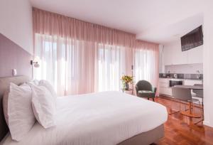 Lisbon Serviced Apartments - Campos客房内的一张或多张床位