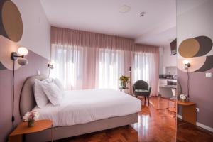 Lisbon Serviced Apartments - Campos客房内的一张或多张床位