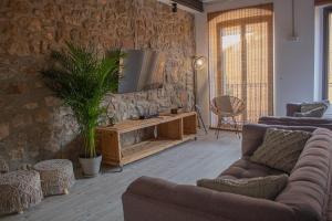 A television and/or entertainment centre at La Casa Del Miracle