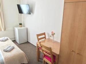 Letto o letti in una camera di Pension Crhan
