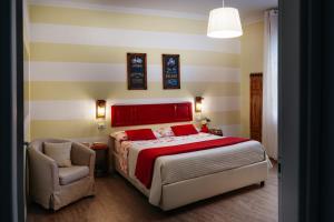 Postel nebo postele na pokoji v ubytování La Bicicletta Rooms