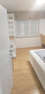 a bedroom with a bunk bed and a ladder at Love 2 Solkan in Nova Gorica