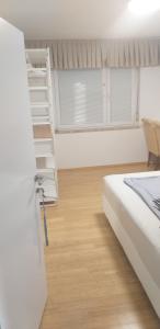Postel nebo postele na pokoji v ubytování Love 2 Solkan