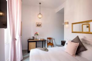 Posteľ alebo postele v izbe v ubytovaní Guesthouse Serafino