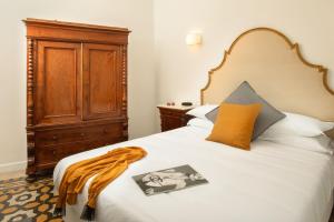 Posteľ alebo postele v izbe v ubytovaní Guesthouse Serafino