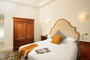 Posteľ alebo postele v izbe v ubytovaní Guesthouse Serafino