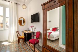 Posteľ alebo postele v izbe v ubytovaní Guesthouse Serafino