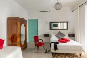 Posteľ alebo postele v izbe v ubytovaní Guesthouse Serafino