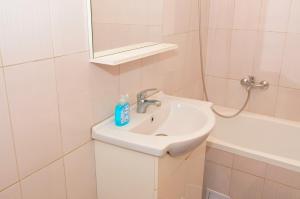 Ένα μπάνιο στο Apartament 7 Central +18 φωτογραφίες
