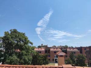 a cloud in the sky over a city at Alberghiera Venezia in Venice