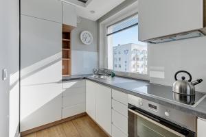 Kuchnia lub aneks kuchenny w obiekcie Comfort Apartments Wyspiańskiego