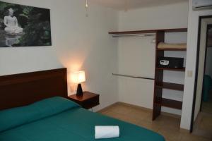 Postel nebo postele na pokoji v ubytování Zenharmony Suites + 37 fotografií