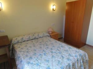 Posteľ alebo postele v izbe v ubytovaní Apartamento Playa Langosteira