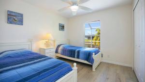 Ein Bett oder Betten in einem Zimmer der Unterkunft !NEW! Villa Waterview