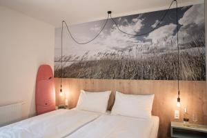 Postel nebo postele na pokoji v ubytování Lakeside77