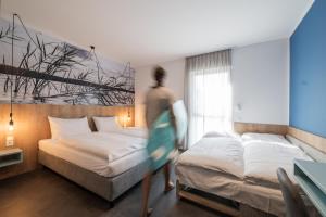 Postel nebo postele na pokoji v ubytování Lakeside77