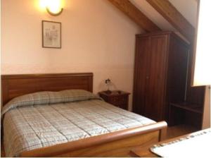 Postel nebo postele na pokoji v ubytování Ristorante Albergo da Giovanni