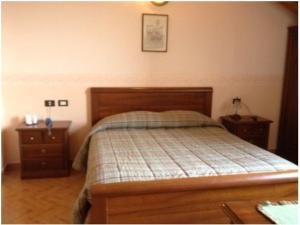 Postel nebo postele na pokoji v ubytování Ristorante Albergo da Giovanni