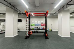 The fitness centre and/or fitness facilities at Kislak 407 Stunning 2BR Corner Apt Retreat Above the City