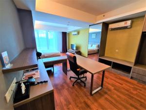 Posezení v ubytování Nexus Regency Suites & Hotel