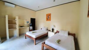 Cama o camas de una habitación en Teratai Boutique Resort