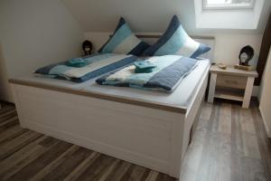 Postel nebo postele na pokoji v ubytování Zur alten Post II