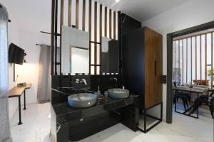 Kuchyň nebo kuchyňský kout v ubytování Orion Eco Suites