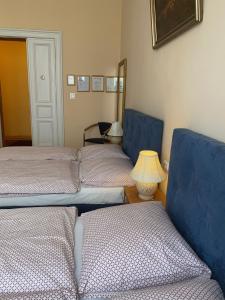 Hotel Gunia tesisinde bir odada yatak veya yataklar