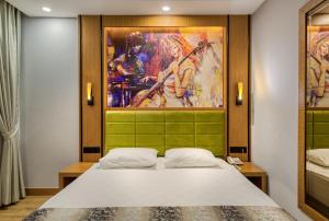 Sealife Buket Resort & Beach Hotel - Ultra All Inclusive客房内的一张或多张床位
