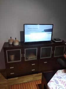 Televízia a/alebo spoločenská miestnosť v ubytovaní María Belkis