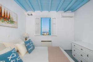A bed or beds in a room at Sea View Villa Serifos Island
