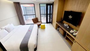 TV in/ali zabaviščno središče v nastanitvi Hotel Skypark DaejeonⅠ