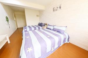 Tempat tidur dalam kamar di 星霖之家
