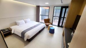 Postelja oz. postelje v sobi nastanitve Hotel Skypark DaejeonⅠ