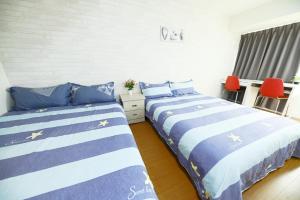 Tempat tidur dalam kamar di 星霖之家