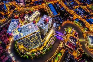 an aerial view of a city at night at Swiss-Garden Hotel Melaka in Malacca