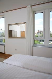 Llit o llits en una habitació de Lothringer Hof