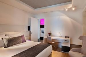 Postel nebo postele na pokoji v ubytování Royal Beach Hotel Tel Aviv by Isrotel Exclusive