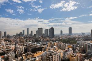 a view of a city with tall buildings at Royal Beach Hotel Tel Aviv by Isrotel Exclusive in Tel Aviv