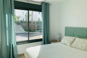 Cama o camas de una habitación en Bright and lovely 3 bed room apartment, Casares Golf