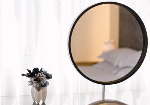 Vuode tai vuoteita majoituspaikassa Brasil Suites Boutique Hotel